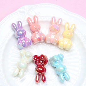 Cute bunny luminous resin beads in various pastel colors with pearl luster finish