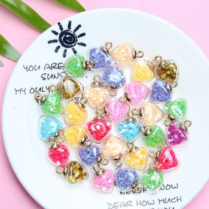 Heart-shaped crystal glass pendants with colorful star sequins for DIY jewelry making
