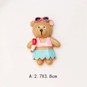 Detailed macro view of a cute resin bear charm wearing summer beach outfit for DIY crafts