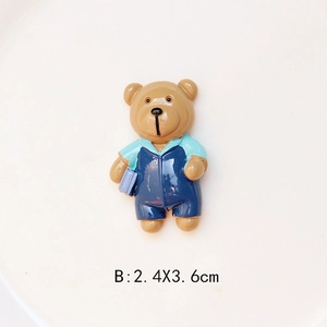 Detail of blue bear resin DIY charm, model B, size 2.4x3.6cm with a glossy finish