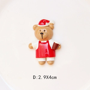 Detailed view of resin Christmas bear with red hat and coffee cup, size 2.9cm x 4.0cm