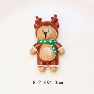 Detailed macro view of a resin bear in deer costume with 2.6x4.3cm size marking