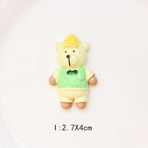 Detailed view of a yellow resin cartoon bear DIY charm with 2.7x4cm size mark