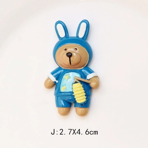 Detail of cartoon bear resin charm in blue rabbit hoodie with lamp, size 2.7x4.6cm