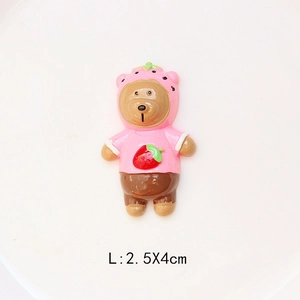 Close-up of a 2.5x4cm resin cartoon bear wearing a pink strawberry hoodie for DIY crafts