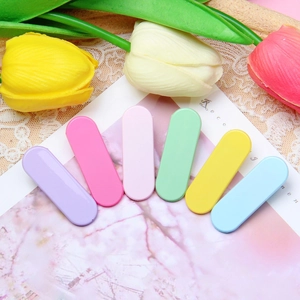 Set of 6 macaron colored matte hair clips for women in pastel pink, blue, and yellow shades