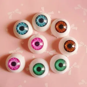 Macro detail of colorful 20mm round doll eyes for DIY creative resin crafts and dolls