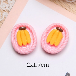 Roze hars fruitmand accessoire met gele banaan voor DIY haarspeldjes, 2x1,7cm afmeting