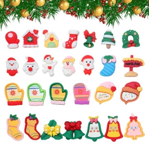 Detailed flat lay of 28 colorful resin Christmas DIY charms for phone cases and crafts