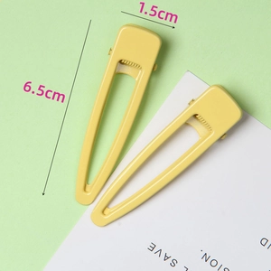Lot de deux barrettes à cheveux gouttes d'eau jaune mat de 6,5cm au fini macaron émaillé