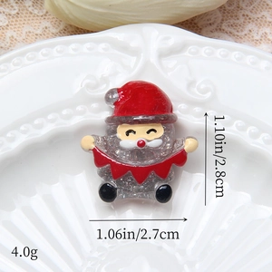Vue détaillée d'une figurine de Père Noël en résine pailletée pour accessoires DIY