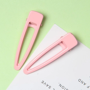 Paire de barrettes à cheveux rose pastel mat avec design évidé et clip en métal robuste