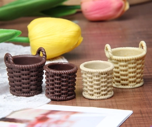 Detailed macro view of miniature resin woven baskets for dollhouse DIY decor