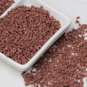 Macro shot of dark brown artificial chocolate crumbs for DIY cream glue craft decoration