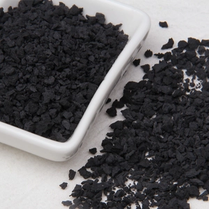 Macro detail of irregular black faux chocolate crumbs and crumbs for DIY crafting deco