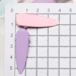 Macaron color metal teardrop hair clips in pink and purple, 5cm size on scale mat