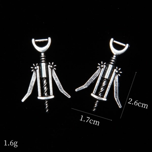 Detail of vintage silver alloy corkscrew charms showing 2.6cm height and 1.7cm width dimensions