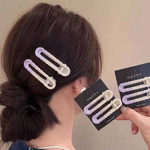 Lot de barrettes à cheveux ondulées avec dégradé violet et finition mate sur carte