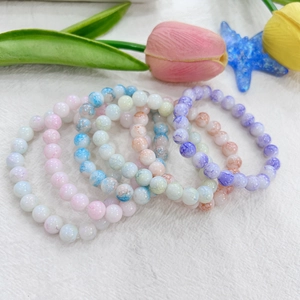 Detailed view of 8mm Chinese ink style glass beads featuring colorful gradient textures