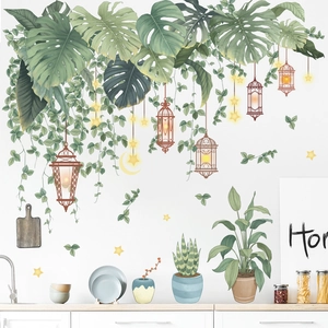 Tropical monstera leaf wall stickers with hanging vines and potted plants for home decor