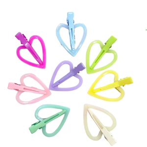 Colorful heart-shaped cutout hair clips in eight vibrant pastel shades for women and girls