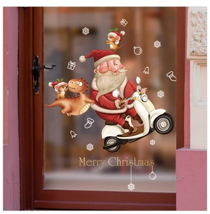 Christmas window stickers set with Santa on motorbike, dinosaur and festive snowflakes