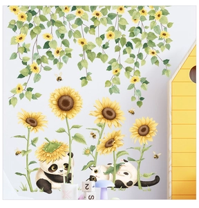 Detail of sunflower and panda wall decals showing hand-painted cartoon illustration style
