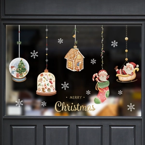 Christmas window stickers set featuring Santa, snowballs, and gingerbread house decor