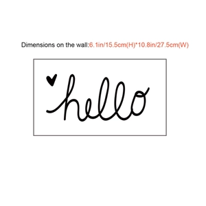 Sticker mural Hello avec motif cœur en écriture cursive noire pour déco nordique
