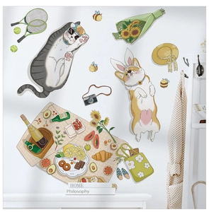 Detailed view of cartoon cat and picnic scene PVC wall stickers on white wall