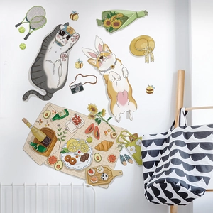 Cute cartoon picnic cat and dog PVC wall stickers for home decor on a white wall