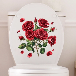 Detailed view of red rose floral waterproof decals applied on a white toilet lid cover