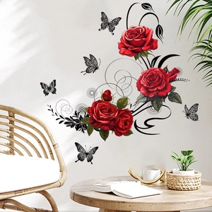 Detail of floral wall sticker showing red roses and black butterflies on white background