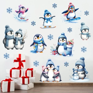 Detailed view of cartoon penguin wall stickers with snowflakes on a white background wall