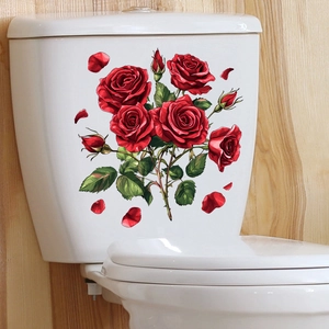 Detail of waterproof red rose self-adhesive wall stickers applied on white ceramic toilet tank