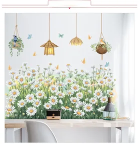 Détail de stickers muraux marguerites blanches avec papillons colorés et panier d'oiseau suspendu