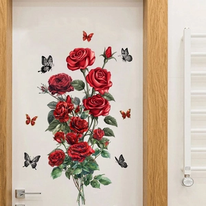 Adesivo murale con rose rosse e farfalle su una porta in legno bianco, dettaglio decoro