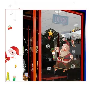 Detail of Santa Claus window static sticker and Merry Christmas decals on glass door