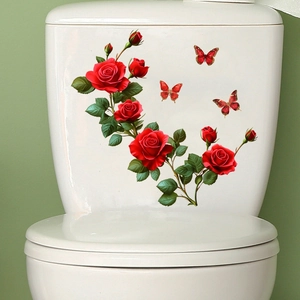 Detail of waterproof red rose and butterfly 3D stickers on a white toilet tank