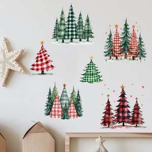 Detail of buffalo plaid Christmas tree wall decals applied on a white surface