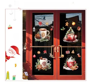 Detail showing hand-drawn Christmas stickers with gingerbread and cocoa on a glass door