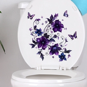 Detail view of purple flower vine and butterfly waterproof stickers on a white surface