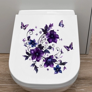 Detail of waterproof purple floral and butterfly self-adhesive decals on a white toilet lid