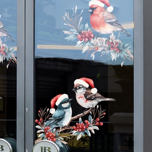 Stickers de Noël pour fenêtres avec oiseaux en aquarelle et bonnets rouges sur verre