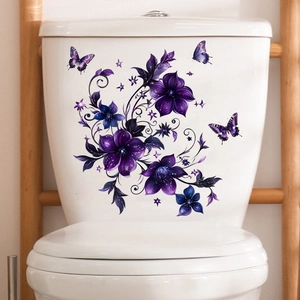 Detail of purple floral vine and butterfly waterproof stickers on a white toilet tank
