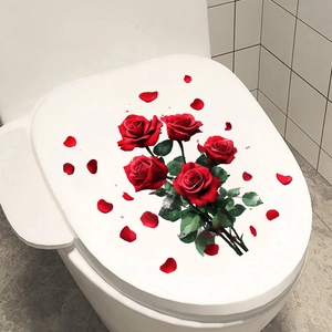 Detail view of red rose waterproof self-adhesive floral stickers applied on a white toilet lid