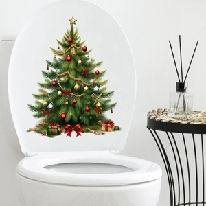 Detail of waterproof PVC Christmas tree wall sticker on a white bathroom toilet lid