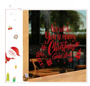Detail of red Christmas window static stickers with Merry Christmas text and festive patterns