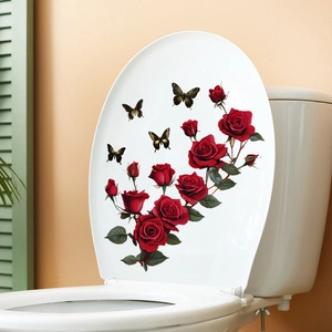 Detail of red rose and gold-trimmed butterfly waterproof stickers on a white toilet lid