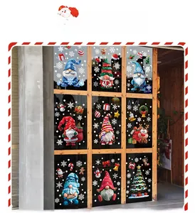 Detailed view of Christmas window clings with festive gnomes, reindeers and Santa Claus